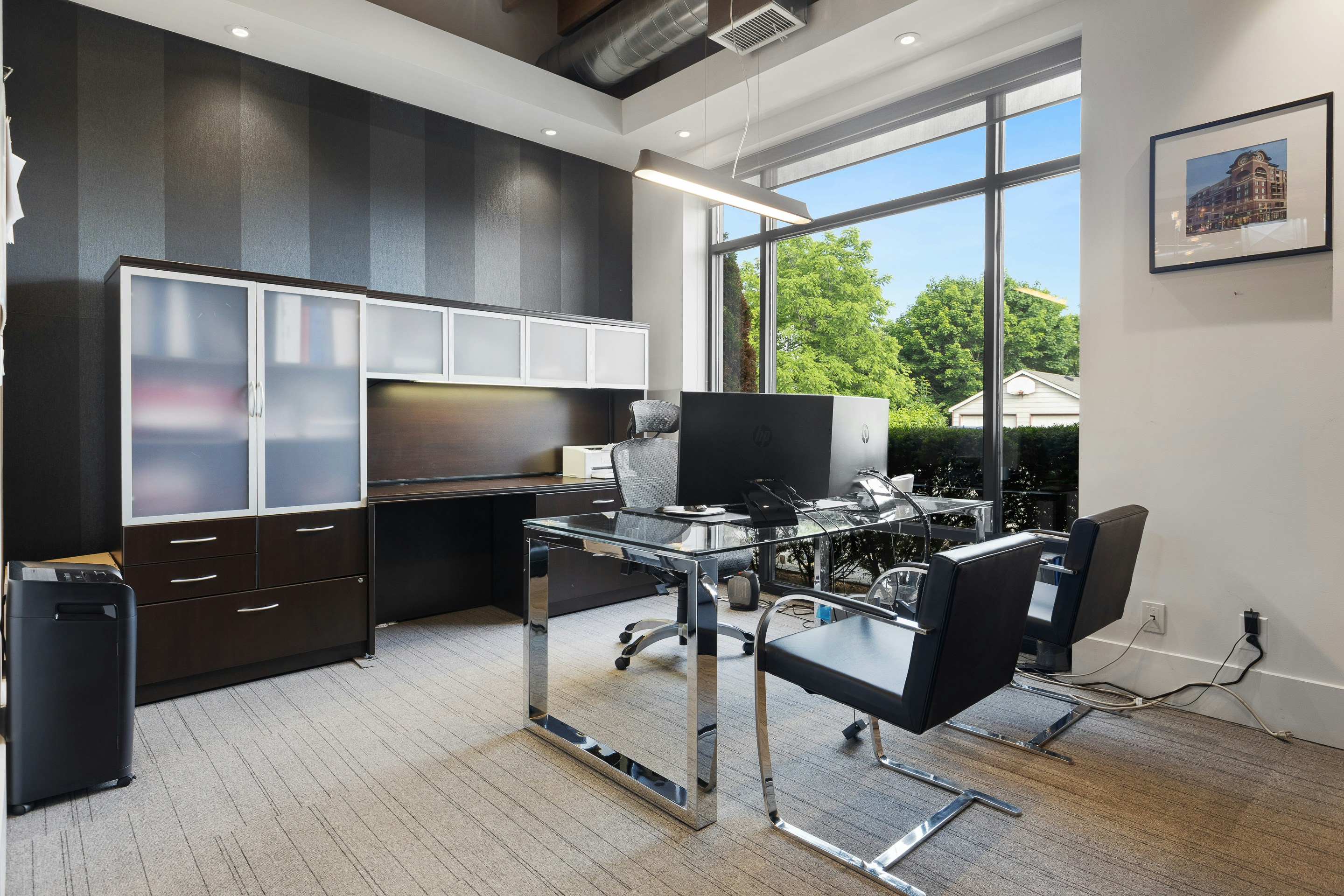 Modern executive office with custom cabinetry